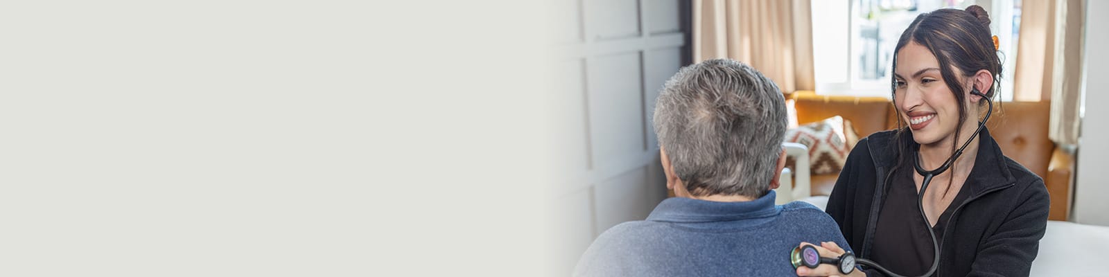 A nurse with a resident at the San Joaquin Nursing and Rehab facility