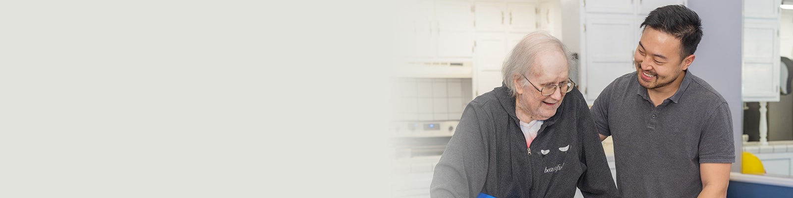 A rehab therapist with a resident at the San Joaquin Nursing and Rehab facility
